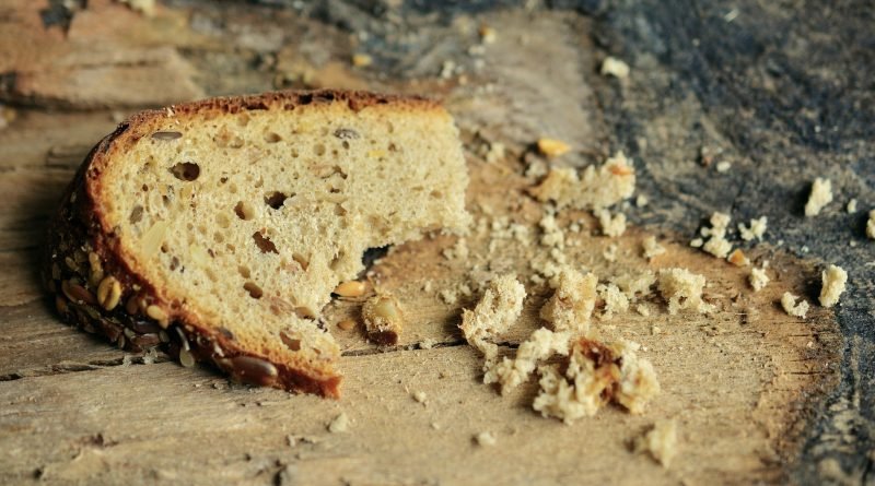 And he commanded the multitude to sit down on the grass, and took the five loaves, and the two fishes, and looking up to heaven, he blessed, and brake, and gave the loaves to his disciples, and the disciples to the multitude.